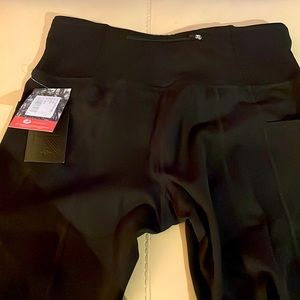Brand new hiking/running capris. My failed weight loss plan is your gain!
